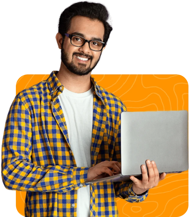 Smiling Man With A Laptop