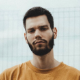 Man in yellow t-shirt